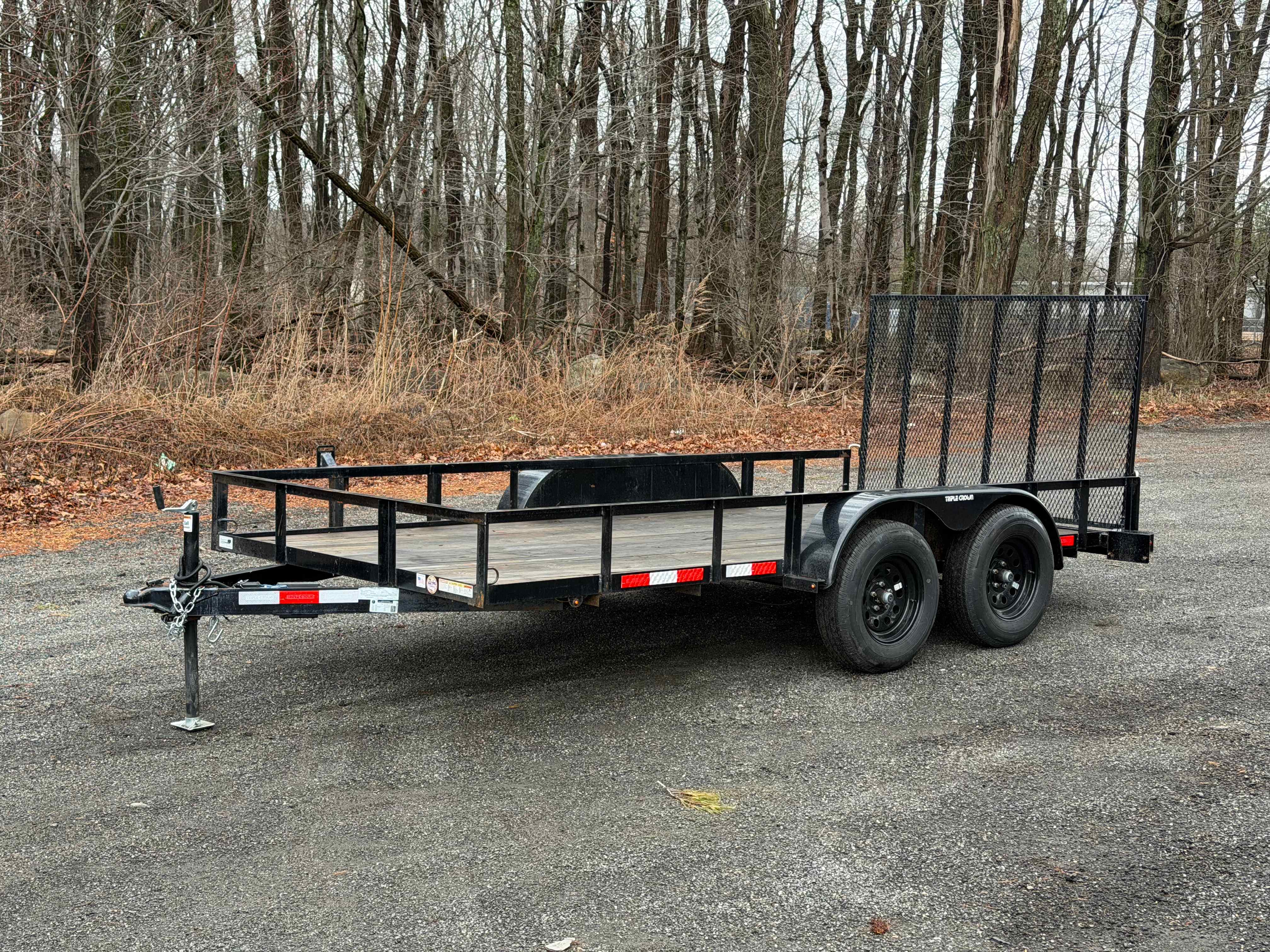 Triple Crown tandem utility trailer ramp open